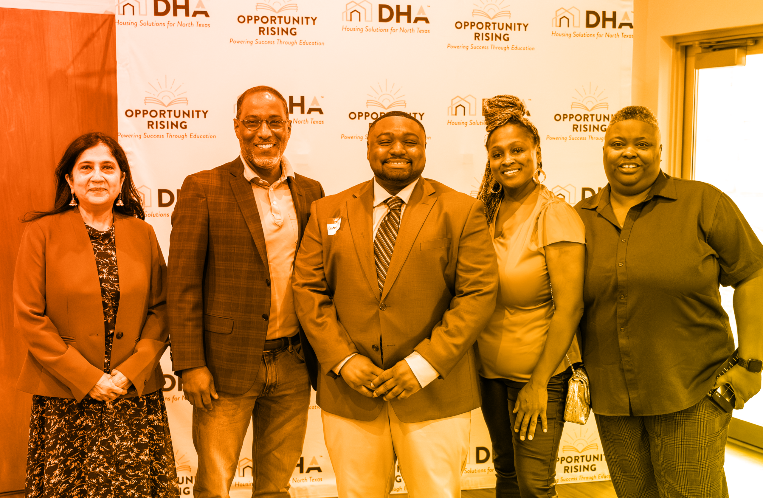 Pictured are DHA Commissioner Almas Muscatwalla, DHA President, CEO, and Board Secretary, Troy Broussard, Ontario Brown, and his parents.